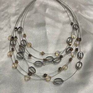 Elegant Multi-Strand Silver and Cream Necklace